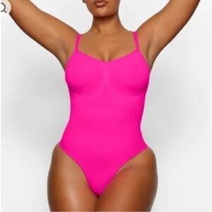 Skims seamless sculpt bodysuit brief with snaps in Flamingo pink L/XL
